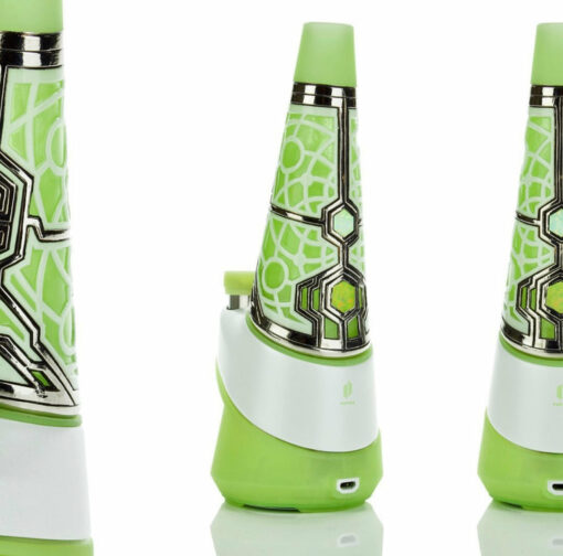 The Ryan Fitt Neon Puffco Peak Complete Set is a futuristic green and white electronic device with geometric patterns, shown against a white background.