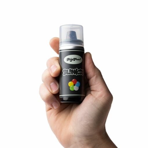 A person holds a small black BIGFUN! Blinksy Vaporizer spray paint can with a clear cap, colorful dots, and the words Blinksy and Big Paint on the label, set against a white background.