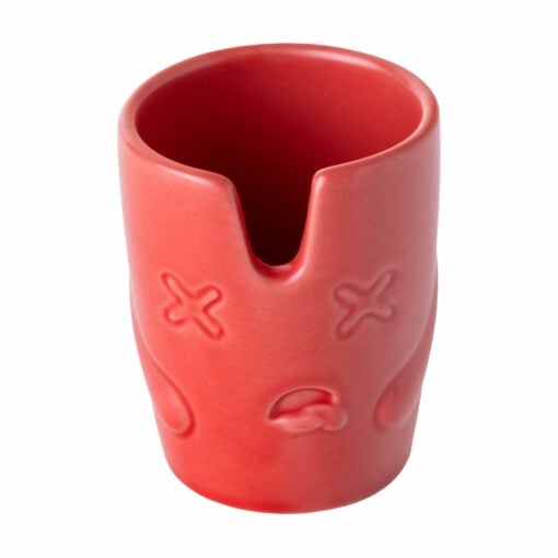 The BigFUN! Potheads Ashtray Set includes a red ceramic cup with a rim notch and an embossed face featuring X eyes and a downturned mouth, adding quirky humor and personality to any ashtray collection.