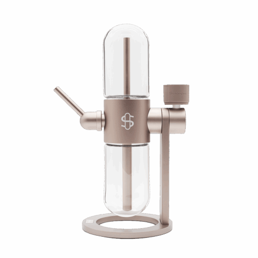 The Stündenglass Gravity Infuser - Desert Rose | 360° Gravity Hookah features a sleek cylindrical design with metallic accents and a side spout, standing upright on a round base against a white background.