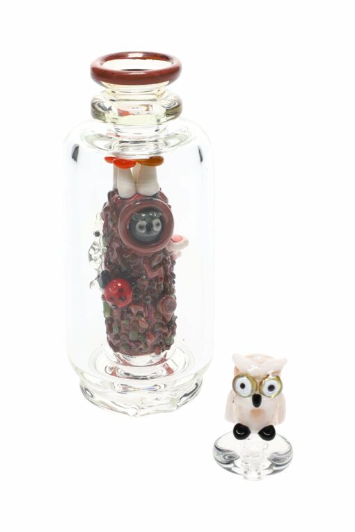 Empire Glassworks 'Renew the Redwood' Peak Attachment showcasing intricate UV-reactive designs, enhancing the aesthetic of your Puffco setup. This US-made attachment is ideal for concentrate enthusiasts, combining functional beauty with high-quality craftsmanship, available at Cannabox.