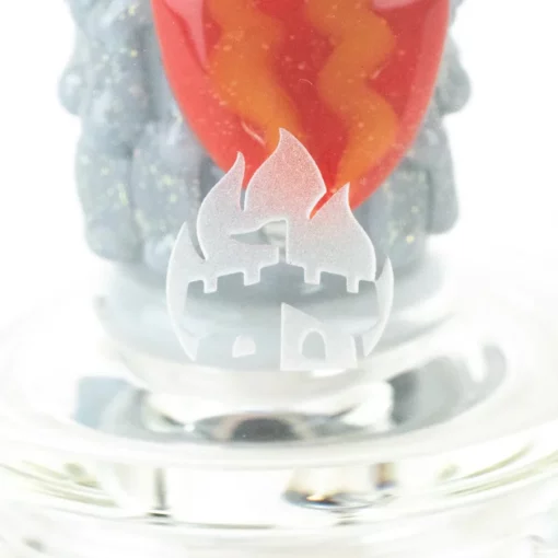 Empire Glassworks Glow Rocket Ship Peak Attachment, a 4½-inch US-made accessory designed to enhance your Puffco setup. This compact, glow-in-the-dark attachment features a whimsical rocket ship design, showcasing vibrant colors and intricate detailing that adds a playful yet functional aesthetic to your cannabis collection. Perfect for those who appreciate unique and artistic smoking accessories, available exclusively at Cannabox.