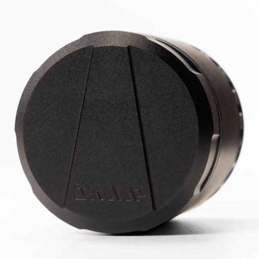 DynaVap DynaGrynd grinder showcasing its anodized aluminum finish, precision micro-rounded teeth, and modular four-piece design for optimal cannabis grinding.