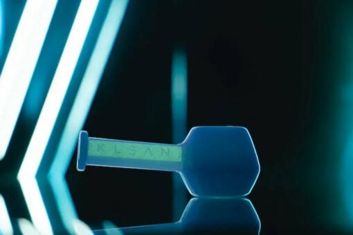 KLEAN White Series Spoon hand pipe made from thick borosilicate glass, featuring a deep bowl and signature glow in the dark stripe.