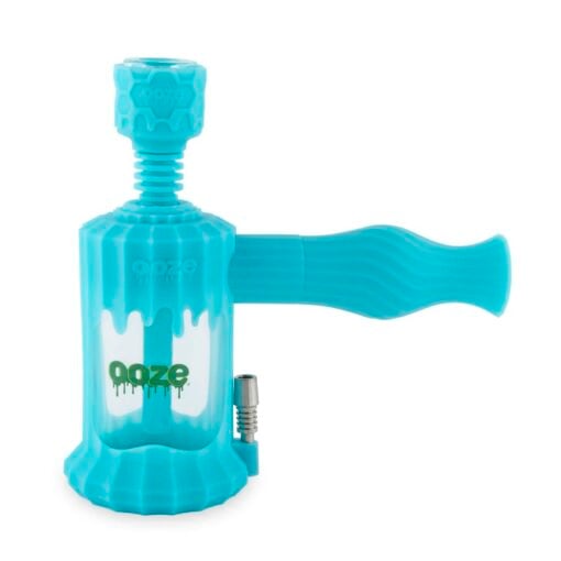 Ooze Clobb 4-in-1 Hybrid Silicone & Glass Water Pipe, featuring a sleek and modern design that combines functionality with aesthetics. This versatile piece allows for seamless transitions between flower, concentrates, and dab straw use, showcasing a unique blend of durable silicone and elegant glass. Perfect for upscale cannabis culture enthusiasts, available at Cannabox. - Ultra Purple