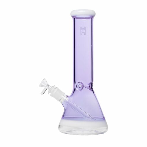 A beautifully handcrafted 12-inch beaker water pipe by Human Grade, showcasing its sleek design and durable construction. The glass pipe features a wide base for stability and a smooth neck for comfortable use, making it an essential addition to any cannabis enthusiast's collection. Ideal for enhancing the smoking experience with both functionality and aesthetic appeal, this piece is perfect for those who appreciate upscale cannabis culture. Available at Cannabox.