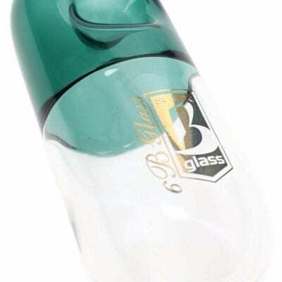 A vibrant 5-inch 6B Glass Pill Steamroller Pipe featuring a colorful design, showcasing its compact and playful aesthetic, perfect for enhancing the smoking experience. Ideal for everyday smokers, available at Cannabox. - Assorted Colors