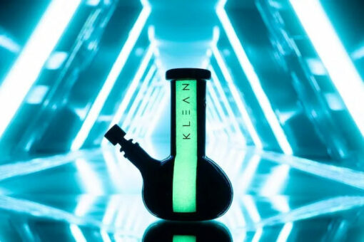 KLEAN Black Series Mini Bong showcasing its round bottom design, 8-inch height, and signature glow-in-the-dark stripe, made from 9mm thick borosilicate glass.