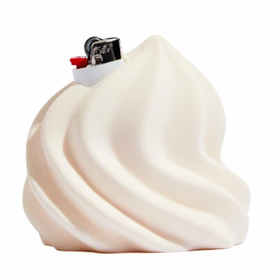 Edie Parker Soft Serve Lighter Holder in vibrant colors, showcasing its playful design and functional silicone material, perfect for standard Bic lighters. - Cream