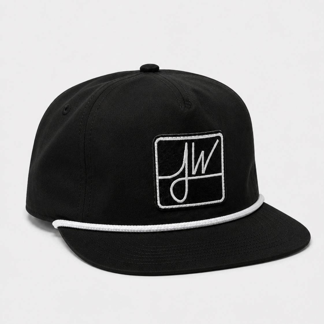 JW Rope Hat by Jane West featuring a khaki crown, black brim, orange rope detail, and a sewn JW square patch on the front, perfect for everyday wear. - Default Title