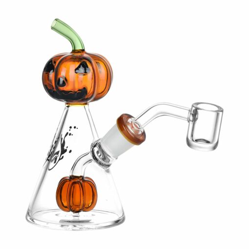 Pulsar Pleasant Pumpkin Pal glass water pipe featuring a whimsical jack-o-lantern design, standing 5.25 inches tall, ideal for everyday use.