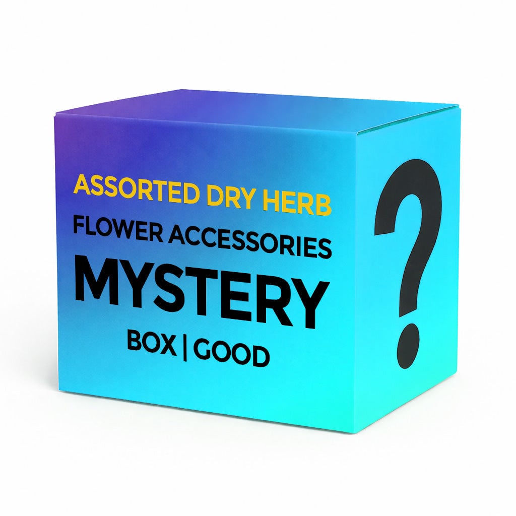 A collection of assorted dry herb flower accessories including rolling papers, grinders, and storage containers displayed in an elegant mystery box. - GOOD