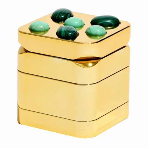 Edie Parker Gemstoned Grinder, a luxurious and stylish smoking accessory from Flower by Edie Parker, featuring a stunning gem-like design that combines glam with functionality. The grinder showcases an ultra-strong magnetic closure for a seamless grinding experience, making it an essential tool for everyday smokers. Perfectly crafted to enhance both the aesthetic and practical aspects of your smoking routine, available at Cannabox. - Malachite